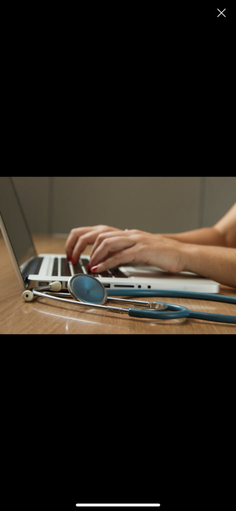 medical professionals using the computer